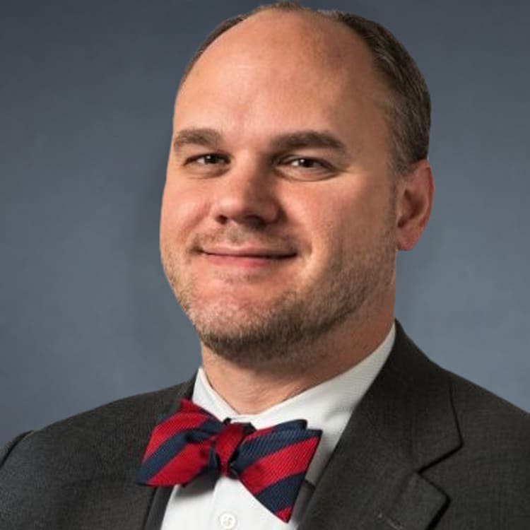 a man wearing a suit and tie